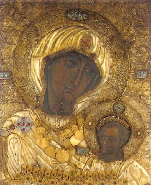 Απεικονίζεται η είκονα της Παναγίας της Πορταϊτισσας και στην αγκαλιά της έχει τον Ιησού