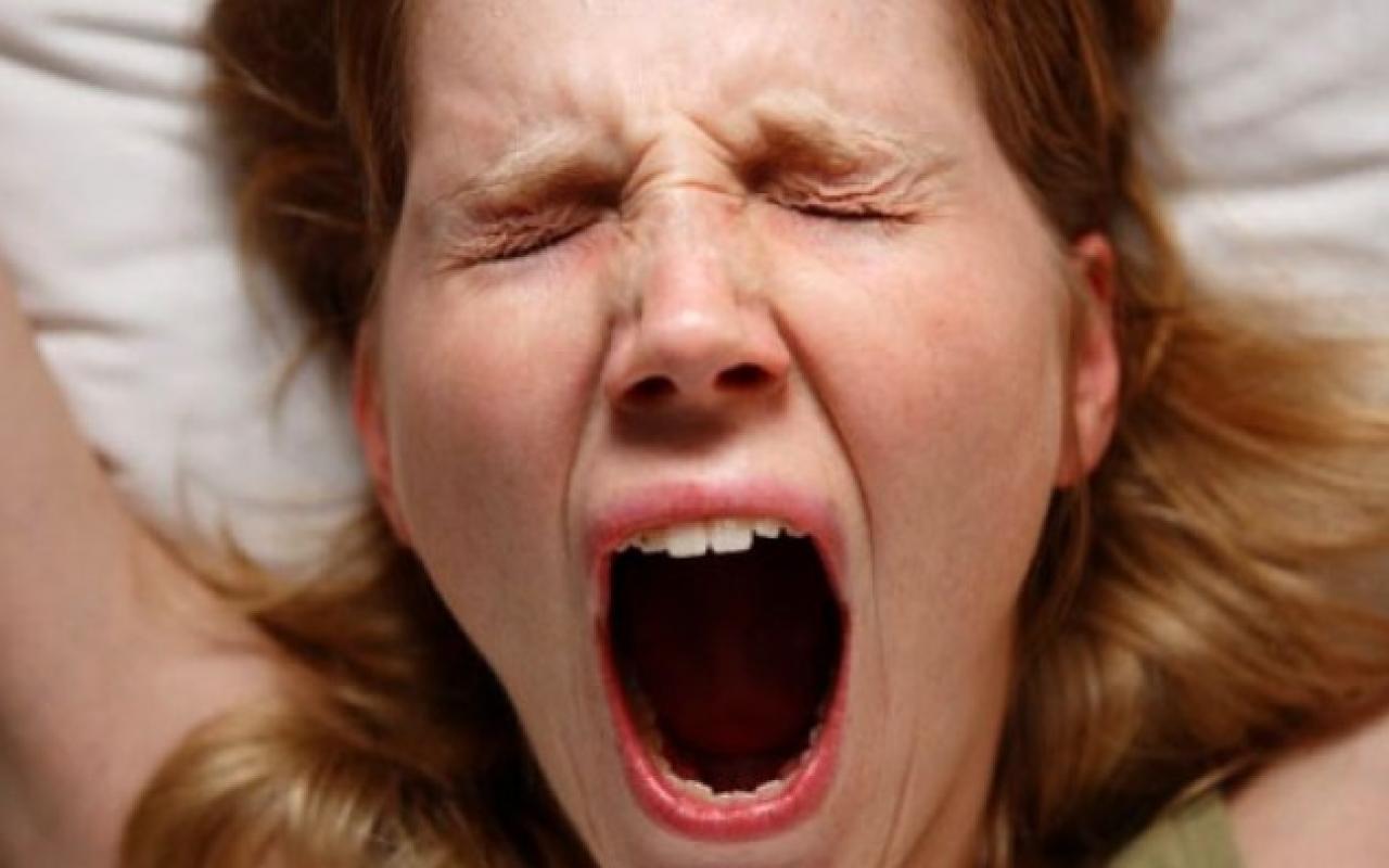 woman-yawning-holder.jpg