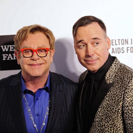141222-elton-john-david-furnish-845a_a8e38de9c1f5df9bcef0e182a69be3c6.jpg