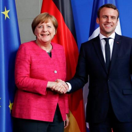 proti-sunantisi-merkel-makron-germania-kai-gallia-anoixtes-se-allagi-ton-europaikon-sunthikon.jpg