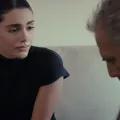 γε