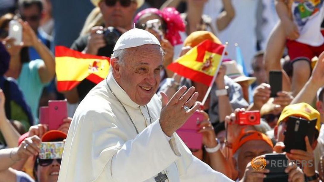 pope-francis-waves-as-he.jpg